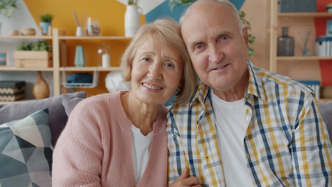 Senior couple relaxing at home while planning a real estate transition in Georgia