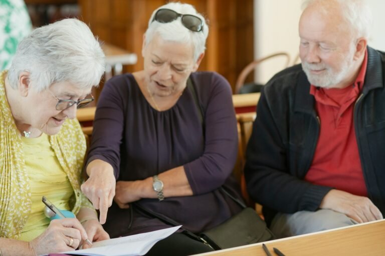 Older adults reviewing a legal document together, like a power of attorney