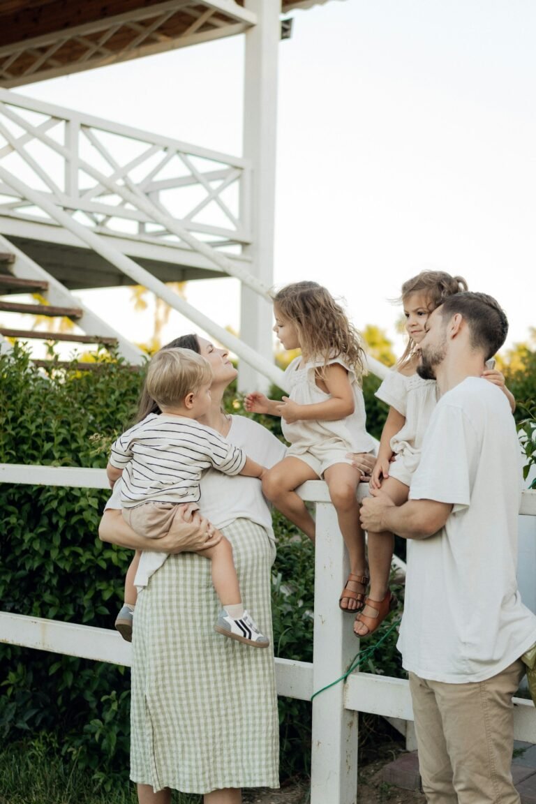 Family together on a porch, the kind of loved ones term life insurance protects