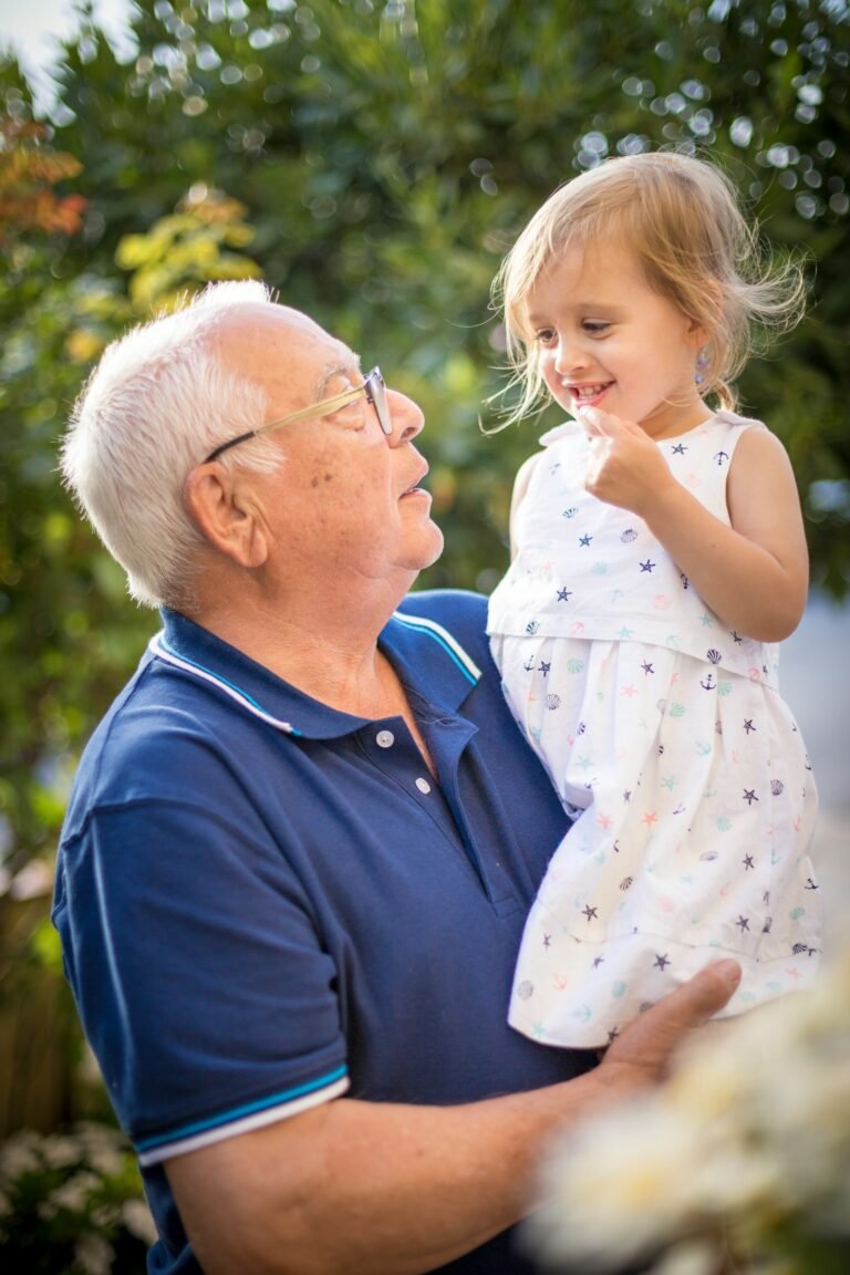 Grandfather and granddaughter together, reflecting the lifelong protection whole life insurance provides